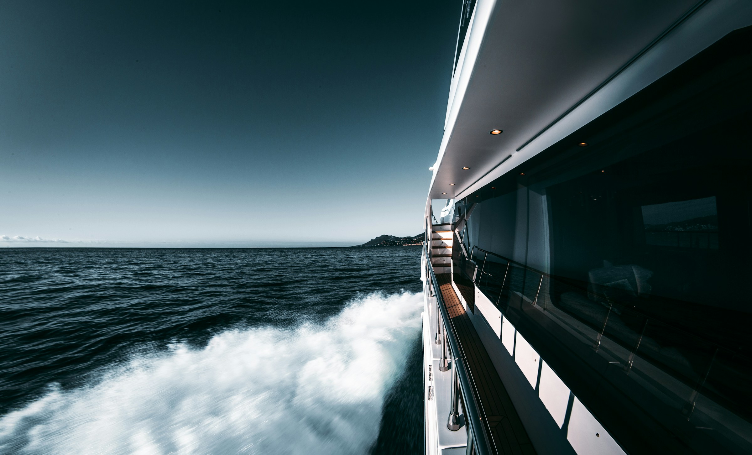 The deck of a luxury motor yacht under way on the French Riviera